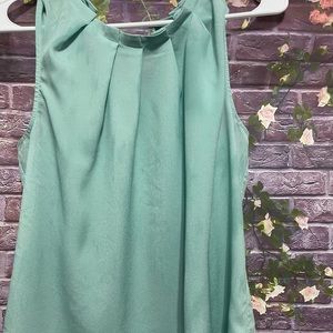 Mint green blouse with pleated neckline